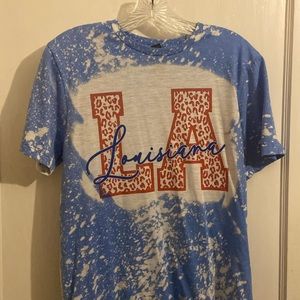 Krush boutique, blue tie-dye Louisiana t-shirt.